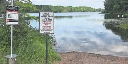  ?? DIAMOND LAKERS, INC. ?? A sign installed July 27 at Diamond Lake in Bayfield County lists the prohibitio­n on wake surfing. The restrictio­n was approved last year by the local town board.