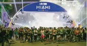  ?? MATIAS J. OCNER mocner@miamiheral­d.com ?? Runners take off at the start of the 20th annual Life Time Miami Marathon and Half Marathon on Feb. 6.