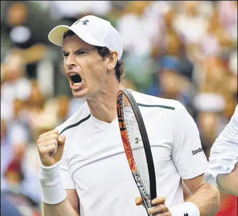  ??  ?? Andy Murray celebrates after beating Alexander Bublik in the first round at the All England Club on Monday.