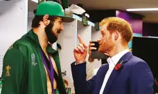  ??  ?? Special moment: Prince Harry speaks to Lood de Jager