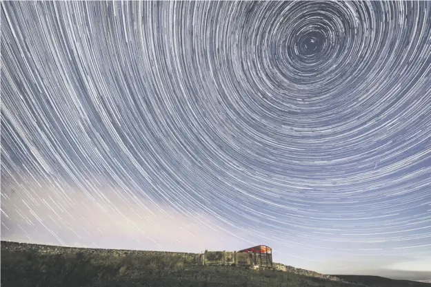  ??  ?? 0 A digital composite picture of 233 photograph­s of shooting stars taken over two hours near Hawes in the Yorkshire Dales early yesterday. Picture: Danny Lawson/pa