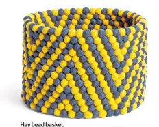  ??  ?? Hay bead basket, £155, Nest.