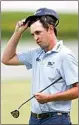  ?? CHARLIE NEIBERGALL / AP ?? J.T. Poston reacts on the 18th green after completing his third round of the John Deere Classic golf tournament on Saturday at TPC Deere Run in Silvis, Ill.