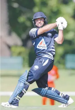  ?? Picture: SARAH MATRAY ?? HITTING OUT: Geelong's Tim Ludeman smashes more runs in leading the Cats to victory.