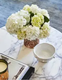  ?? ?? 3 3. The marble-topped coffee table is an elegant surface for Lauren’s ornaments.