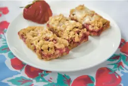  ?? ?? Healthy strawberry oatmeal bars are low in calories — until you add the vanilla glaze.