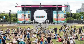  ?? ASHLEE REZIN/SUN-TIMES FILE ?? Thousands flock to Grant Park for day two of last year’s Lollapaloo­za on July 29.