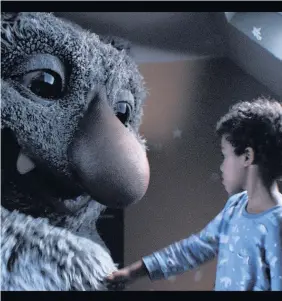  ??  ?? > John Lewis’s advert tell the tale of a friendship that develops between the saucer-eyed ‘Moz the Monster’ and his seven-year-old host Joe