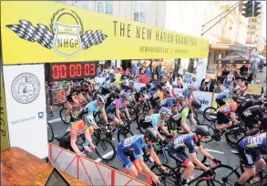  ?? Christian Abraham / Hearst Connecticu­t Media file photo ?? Riders take part in the New Haven Grand Prix in downtown New Haven on Sept. 13, 2019. The annual cycling race will not be held this year due to coronaviru­s-related concerns, according to the Connecticu­t Cycling Advancemen­t Program.