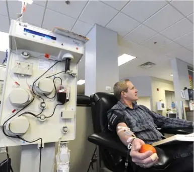  ?? STEVE RUARK/THE ASSOCIATED PRESS ?? A man donates plasma at a plasma donation centre in Frederick, Md. “The practice of for-profit plasma collection is widespread in the United States and has been called into question there,” Dr. Danyaal Raza writes.