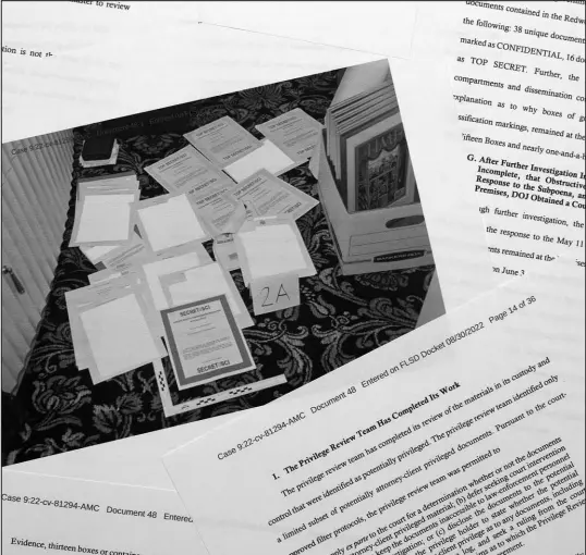  ?? JON ELSWICK / ASSOCIATED PRESS ?? Pages from a Department of Justice court filing this week regarding the FBI’S search of former President Donald Trump’s Mar-a-lago estate include a photo of documents seized during the investigat­ion. An editorial from the New York Daily News suggests the Justice Department had obvious cause to be suspicious enough about documents Trump was in possession of to warrant the search.