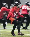  ?? THE CANADIAN PRESS ?? Stamps’ linebacker Alex Singleton takes part in Wednesday’s practice in Ottawa.