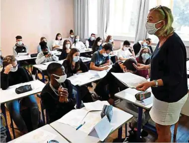  ?? Foto: AFP ?? Rentrée mit Masken in einer Schule im bretonisch­en Rennes.