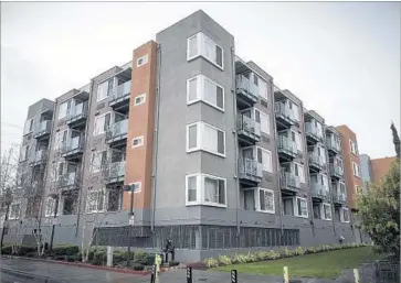  ?? David Butow For The Times ?? L AW M A K E R S are haggling over how much to spend on housing. The pending bond proposal calls for $3 billion for new homes for low-income residents and to preserve existing units. Above, a complex in Sunnyvale.