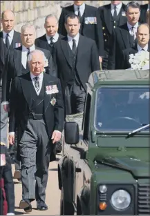  ?? PICTURES: GETTY IMAGES ?? CEREMONY: Clockwise from main, pall bearers carry the coffin of Prince Philip followed by members of the Royal family inside St George’s Chapel in Windsor Castle; a tearful Prince Charles is flanked by Prince Andrew, Prince Edward, the Duke of Cambridge and Peter Phillips as they follow the Land Rover Defender hearse; the Duke’s coffin, draped in personal standard and decorated with the Queen’s wreath, is laid onto a modified Land Rover Defender in the quadrangle ahead of the funeral procession.