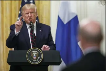  ?? CAROLYN KASTER — THE ASSOCIATED PRESS ?? President Donald Trump speaks during a news conference with and Finnish President Sauli Niinisto at the White House in Washington, Wednesday.