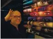  ?? KARL MONDON — STAFF PHOTOGRAPH­ER ?? 3Below Theaters owner Scott Guggenheim poses next to a movie poster display inside one of the screening rooms. The theater reopened Friday for the first time since the pandemic shutdown.