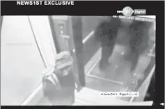  ??  ?? A man with a backpack is seen in Shangri La hotel elevator in this screen grab taken from a CCTV footage. — Reuters photo