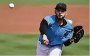  ?? MARK BROWN Getty Images ?? Pablo Lopez pitches two shutout innings Tuesday against the Cardinals in his first spring outing in Jupiter.