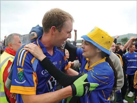  ??  ?? Wicklow’s Dara Ó Hannaidh is congratula­ted by his girlfriend Orla Buckley after the final whistle in Aughrim in 2009.