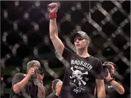  ?? Canadian Press file photo ?? Kelowna’s Rory MacDonald salutes the crowd after beating Tarec Saffiedine in their welterweig­ht bout at UFC Fight Night 4 in Halifax back on Oct. 4, 2014.