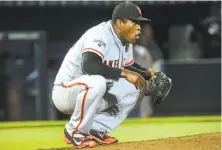  ?? John Amis / Associated Press 2015 ?? Closer Santiago Casilla blew nine saves in 2016 and had a sour attitude about how Giants manager Bruce Bochy used him.