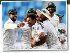  ?? GETTY IMAGES/ ACTION IMAGES ?? Death throes: Jimmy Anderson fights to the end, which arrives as Yasir Shah, left, snares Adil Rashid, below