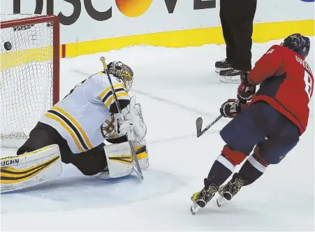  ?? AP PHOTO ?? BEATEN: Alex Ovechkin scores on goalie Anton Khudobin for the only goal of the shootout, lifting the Capitals past the Bruins yet again.