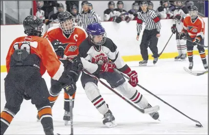  ?? CODY MCEACHERN/TRURO DAILY NEWS ?? The Bantom AA Sackville Flyers took out the Bantom AA Truro Bearcats 4-2 Wednesday in their first game of the annual Mike Schmitt Memorial Hockey Tournament at Colchester Legion Stadium. The tournament runs from until Dec. 30 at Colchester County...