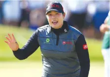  ??  ?? Ariya Jutanugarn of Thailand reacts after sinking her birdie putt on the 1st playoff hole to win during the final round of the Manulife LPGA Classic at Whistle Bear Golf Club on Sunday in Cambridge, Canada. (AFP)