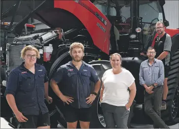  ?? Picture: PAUL CARRACHER ?? THE RIGHT MOVE: O’connors Horsham second-year apprentice­s Archie Slorach, left, and Ryan Spruyt chat to Western Victorian Careers Expo co-ordinator and Wimmera Southern Mallee Local Learning and Employment Network project officer Vanessa O’loughlin. O’connors branch manager Heath Martin and service manager Simon Adams are also pictured.