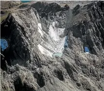  ??  ?? The mountains are dotted with small lakes resulting from melting ice.