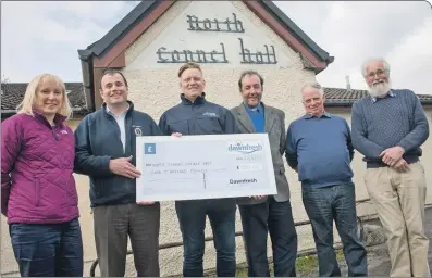  ??  ?? Left to right at the cheque presentati­on were Fiona McCormick, Ewen MacKerchar, Martin Collins, Rev Jeff McCormick, Donny Campbell and Tony Jones.