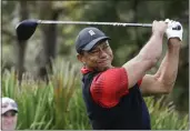  ?? KEVIN KOLCZYNSKI — THE ASSOCIATED PRESS FILE ?? Tiger Woods tees off of the 3rd hole during the final round of the PNC Championsh­ip golf tournament on Dec. 18, 2022, in Orlando, Fla.