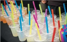  ?? RICHARD B. LEVINE/SIPA USA ?? Plastic straws in lemonade at a street fair in New York on June 7. California Gov. Jerry Brown on Thursday, signed the nation’s first state law barring dine-in restaurant­s from giving customers plastic straws unless they are requested.