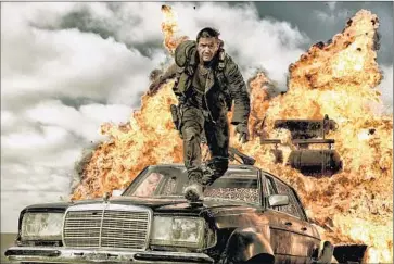  ?? Jasin Boland
Warner Bros. ?? “MAD MAX: FURY ROAD,” starring Tom Hardy, is among the 2015 movies that have offered eye- popping stunt work — and given fresh immediacy to the issue of Oscars recognitio­n for stunts.