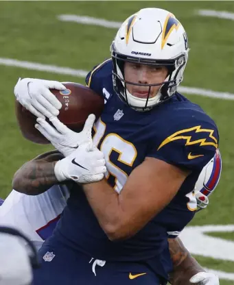  ?? AP FIle; toP, matt stone / herald staFF FIle ?? HIGH PRAISE: Chargers tight end Hunter Henry could be targeted by the Patriots in free agency next season, with coach Bill Belichick (top) calling him a ‘complete and very good football player.’