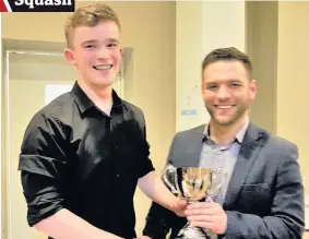  ??  ?? Top Robbie Hunter receives his award from league secretary Dougie Brown