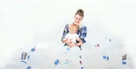  ?? AMANDA MCBROOM PHOTOGRAPH­Y ?? Christina Nichter, pictured with her son Jayden, donated 128 gallons of breast milk to other mothers.