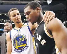  ?? FRANK GUNN/THE CANADIAN PRESS ?? Golden State Warriors guard Stephen Curry and Toronto Raptors guard Kyle Lowry converse during action in Toronto on Wednesday.