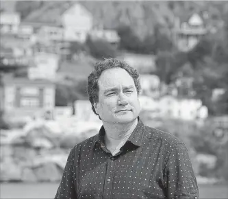  ?? PAUL DALY
THE CANADIAN PRESS ?? Mark Critch’s new book, " Son of a Critch," highlights his love for his hometown of St. John’s.