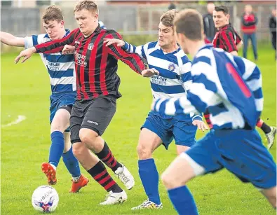  ??  ?? Action from last week’s North League clash between Violet, blue, and Scone Thistle. Fraser Band.