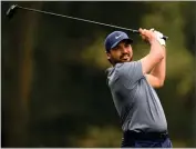  ?? AP PHOTO BY NICK WASS ?? Jason Day of, Australia, hits off the 11th tee during the first round of the Wells Fargo Championsh­ip golf tournament, Thursday, May 5, 2022, at TPC Potomac at Avenel Farm golf club in Potomac, Md.