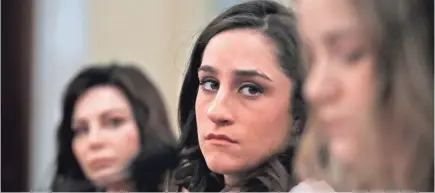  ?? MANUEL BALCE CENETA/AP ?? Olympic gold medalist gymnast Jordyn Wieber, center, and Olympic bronze medalist Jamie Dantzscher, left, listen to testimony of speedskate­r Bridie Farrell, right, on her experience­s of being sexually assaulted.