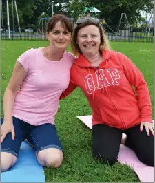  ?? Ciara Moriarty and Ailish Teahan pictured in the Tralee Town Park on Wednesday for outdoor charity yoga. ??