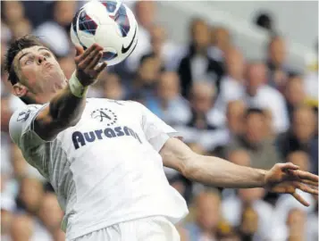  ?? (Photo: AFP) ?? In this file photo taken on May 19, 2013, Tottenham Hotspur’s Welsh midfielder Gareth Bale controls the ball during the English Premier League match against Sunderland at White Hart Lane in north London.