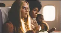  ?? The Associated Press ?? MOVIE: This image released by LD Entertainm­ent and Roadside Attraction­s shows Alicia Vikander as Gloria Steinem, left, and Janelle Monae as Dorothy Pitman Hughes in a scene from “The Glorias,” premiering Wednesday on Amazon Prime.