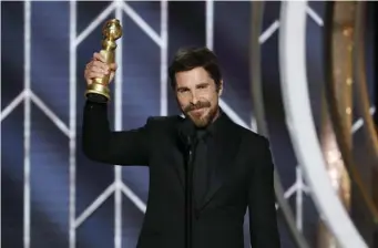  ?? AP ?? THE DEVIL MADE HIM DO IT: Christian Bale, seen accepting the Golden Globe for his role in ‘Vice,’ said Satan was his inspiratio­n for playing Dick Cheney.