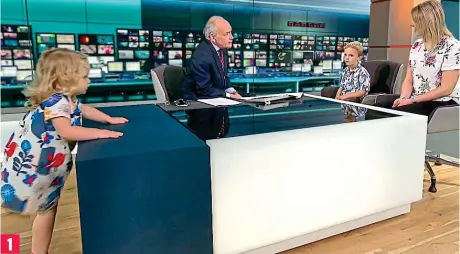  ?? ?? Ready to cause mischief: Two-year-old Iris in the ITV studio with mother Lucy and big brother George