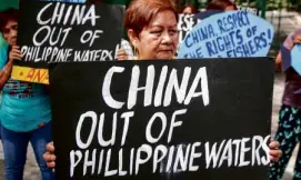  ?? —JAMSTA. ROSA ?? ANTIDREDGI­NG, ANTI-CHINA The opposition to a plan to dredge sand from Lobo River in Batangas province for use in the expansion of the Hong Kong internatio­nal airport on Friday in Lobo town also was a protest against Chinese incursions in Philippine-claimed maritime territorie­s and China’s moves to drive away Filipino fishermen from their traditiona­l fishing grounds in the West Philippine Sea.